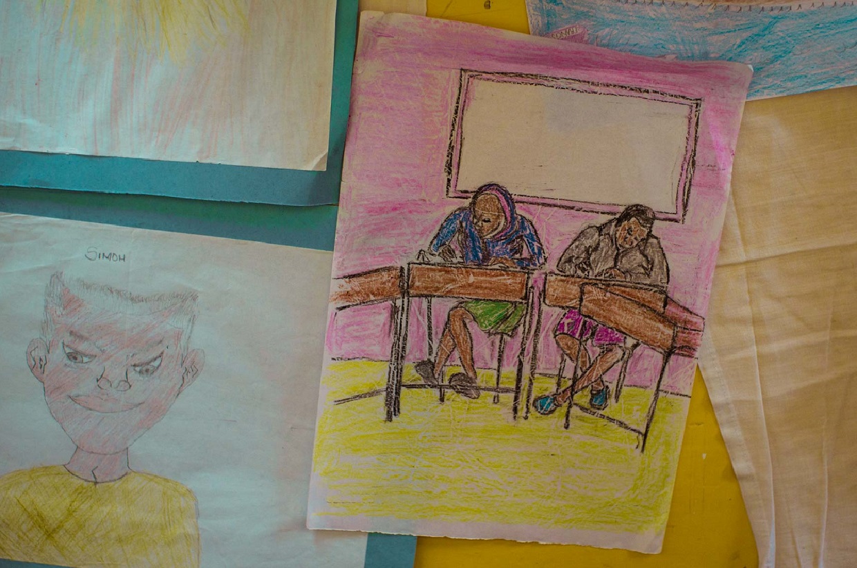 Drawing of children learning